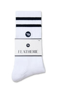 White sock with black stripes and 'Featherie' branding on a white background