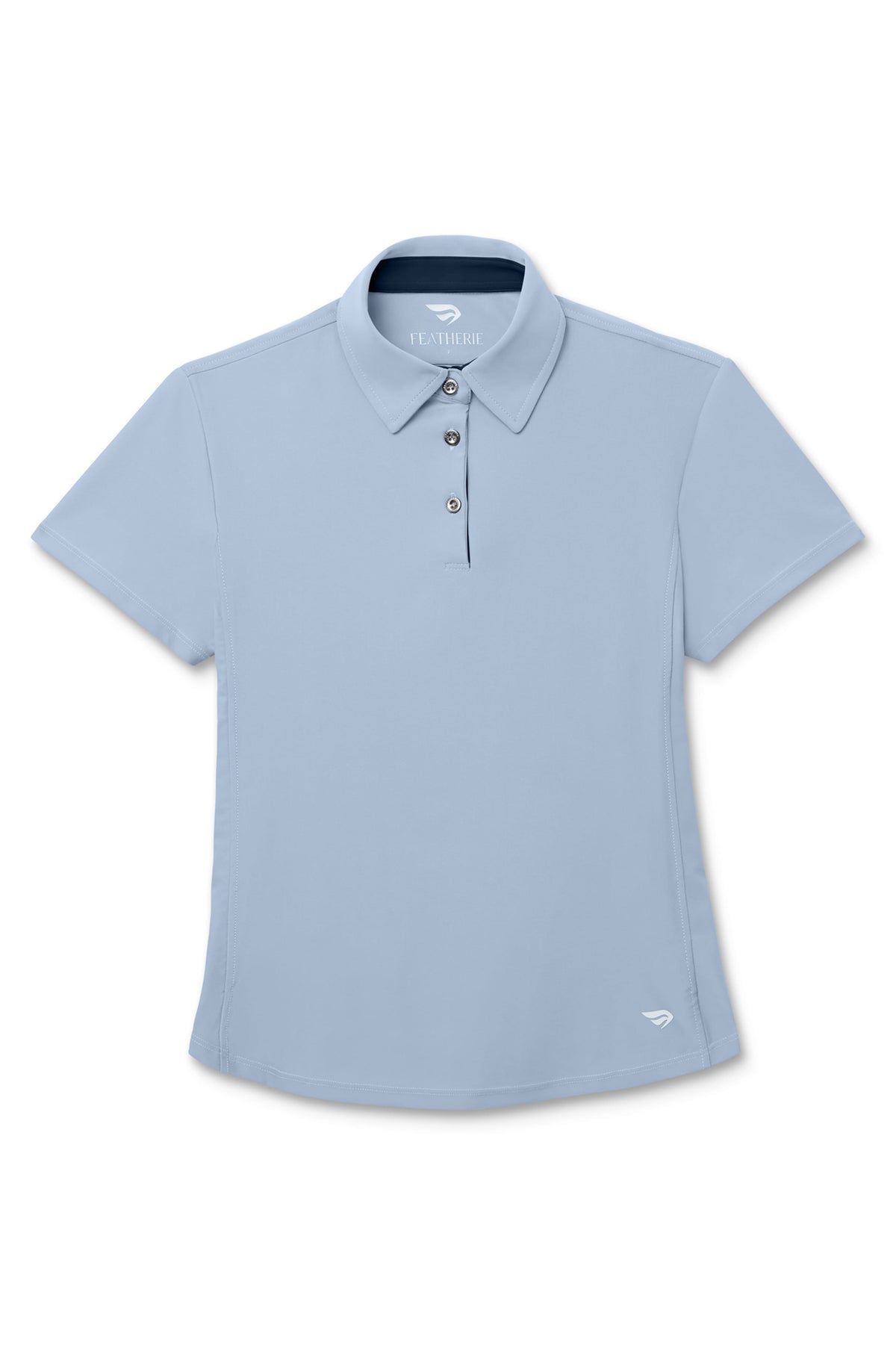 Skyline | A light blue short-sleeve polo shirt with a three-button placket and a small white logo on the lower hem, displayed against a solid white background.