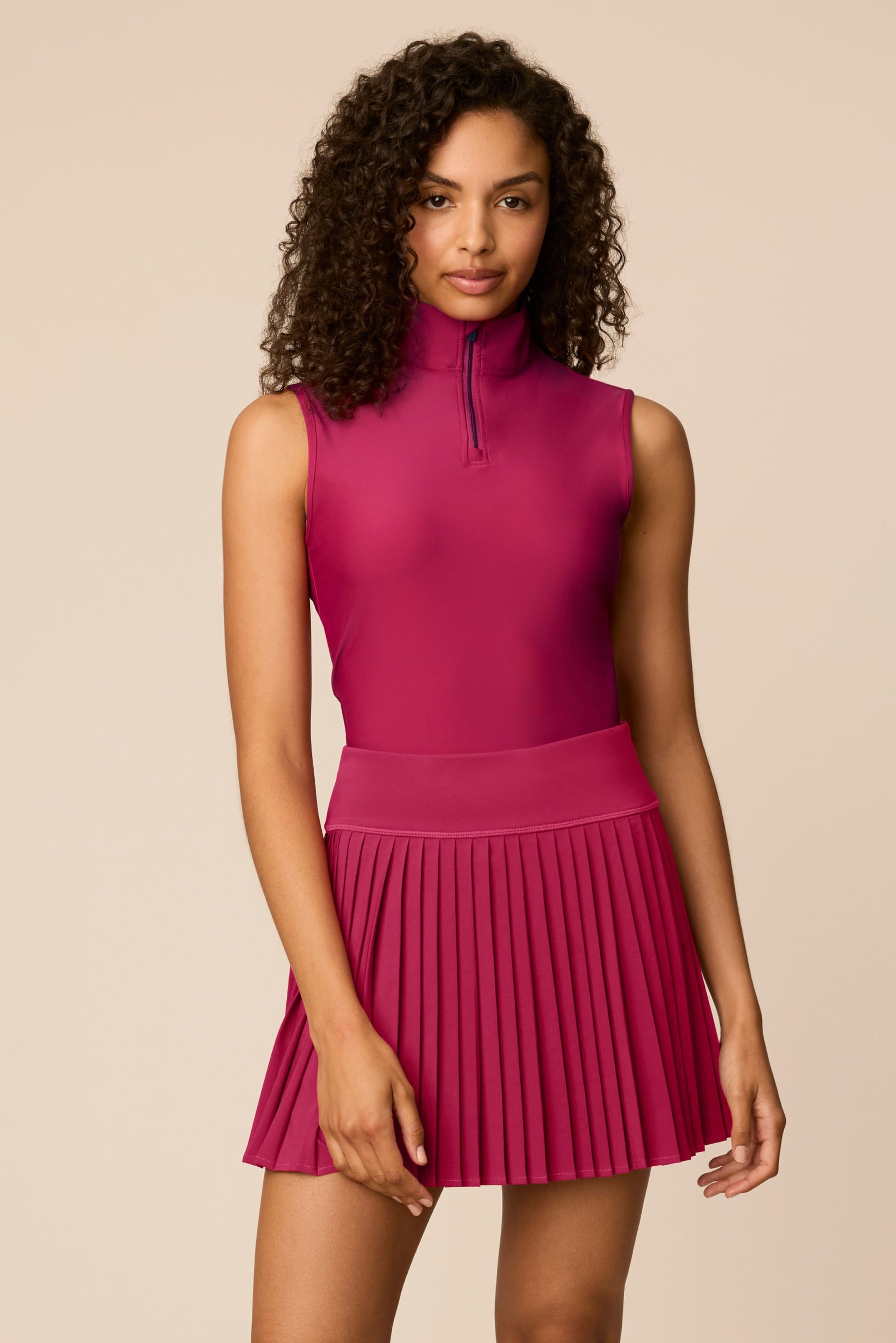 Aurora | Woman wearing The Michelle Pleated Skort 15