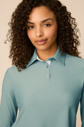 Meadow Haze | Woman wearing The Ella Long Sleeve Polo on a beige background