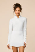 White | Model wearing a white Sophia a-line skort on a beige background