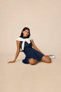 Midnight | Woman wearing The Michelle Pleated Skort 15