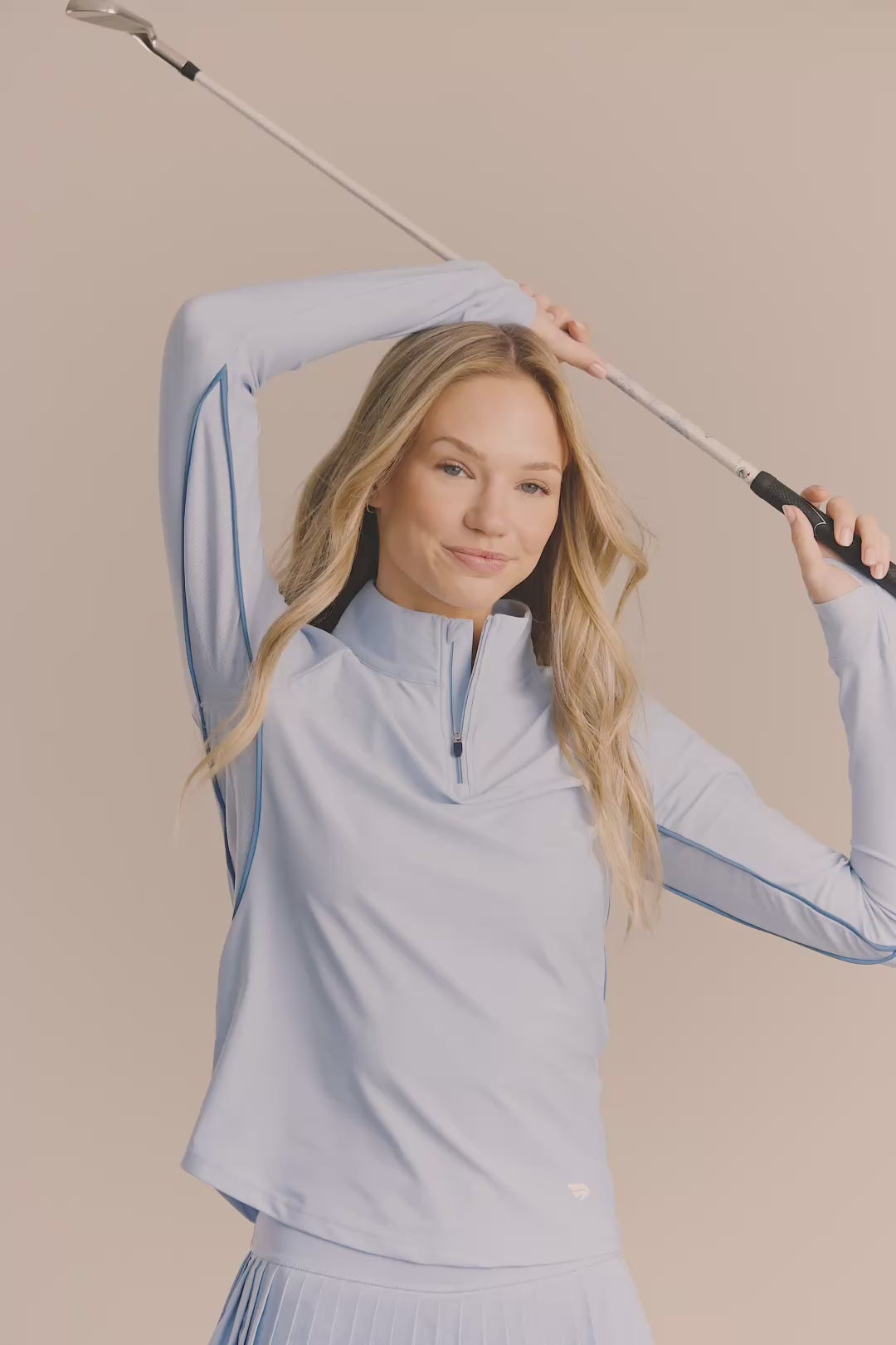 Skyline | Woman wearing quarter zip long sleeve
